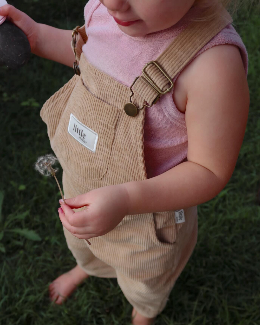 Latte Neutral Corduroy overall for babies, toddlers and kids. Made from soft cotton with adjustable straps and a relaxed fit.