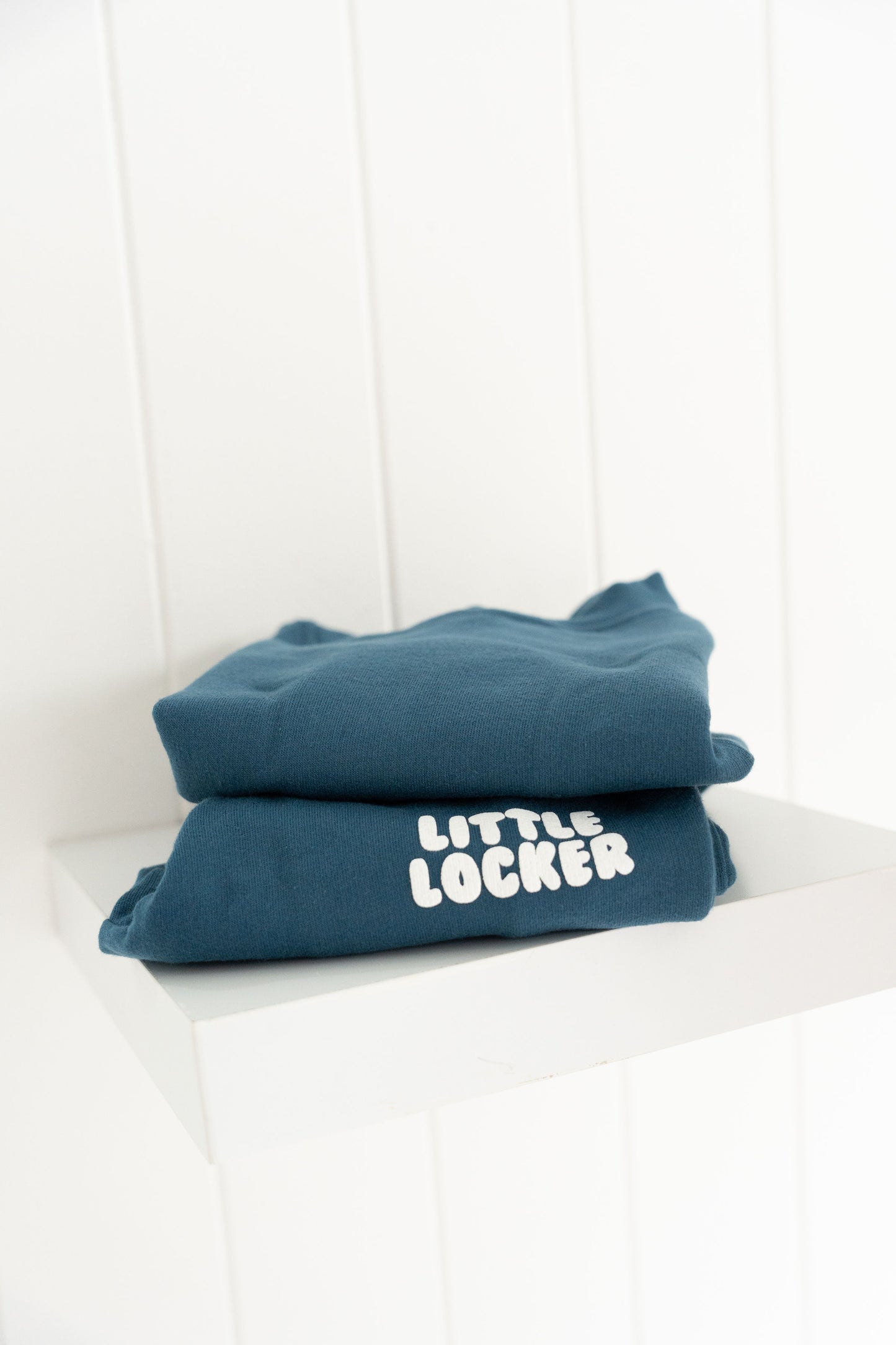 Midnight blue puff print track set for babies, toddler and kids. Made from soft cotton with relaxed fit and puff print logo