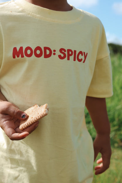 Close up of Little Locker's sustainable ethically made cotton graphic t-shirt featuring MOOD: SPICY print.