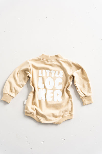 Cotton puff print romper in chocolate brown for babies and toddlers with puff print logo