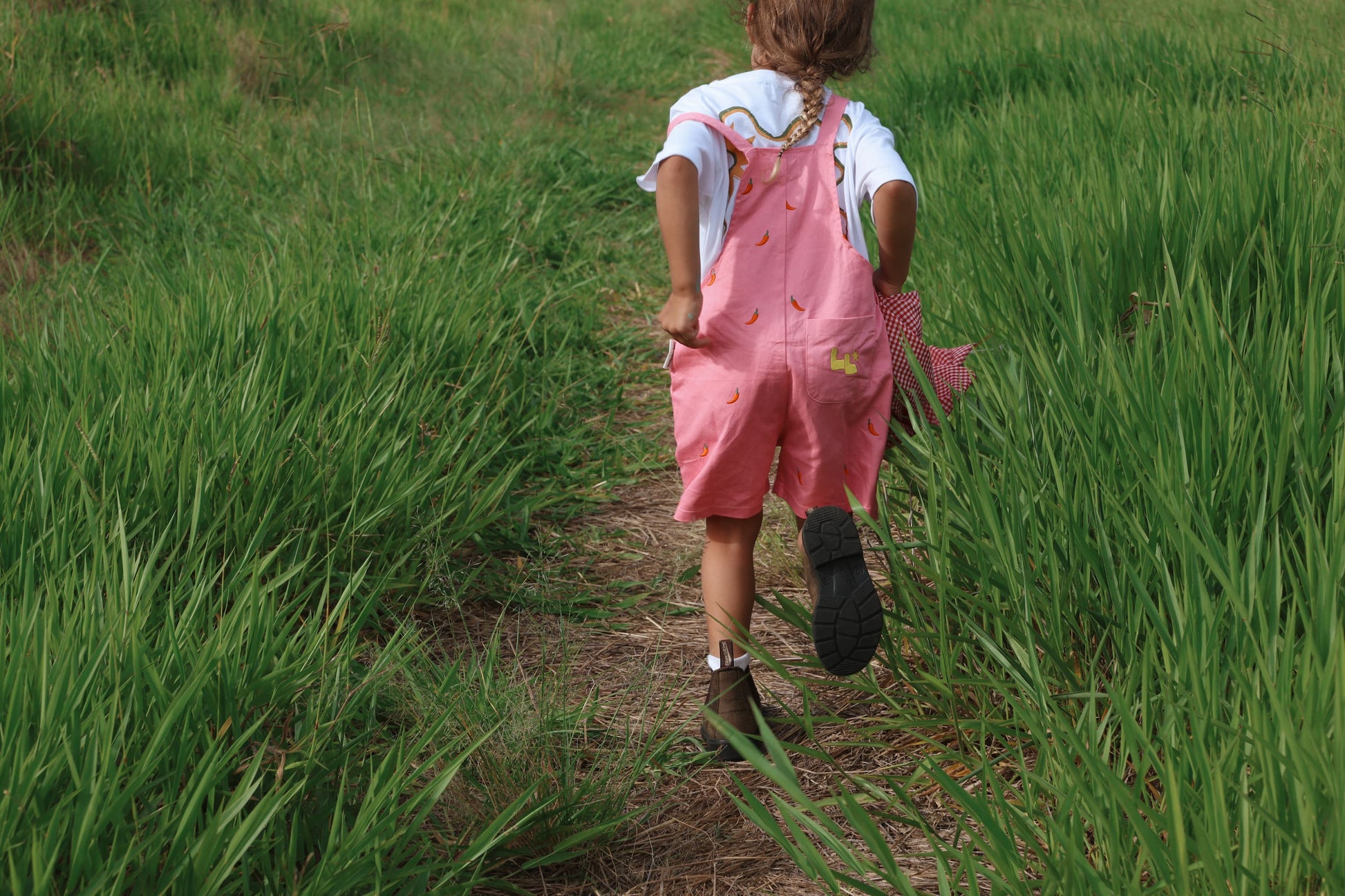 Pink cotton summer overalls for girls. Made ethically by Little Locker.