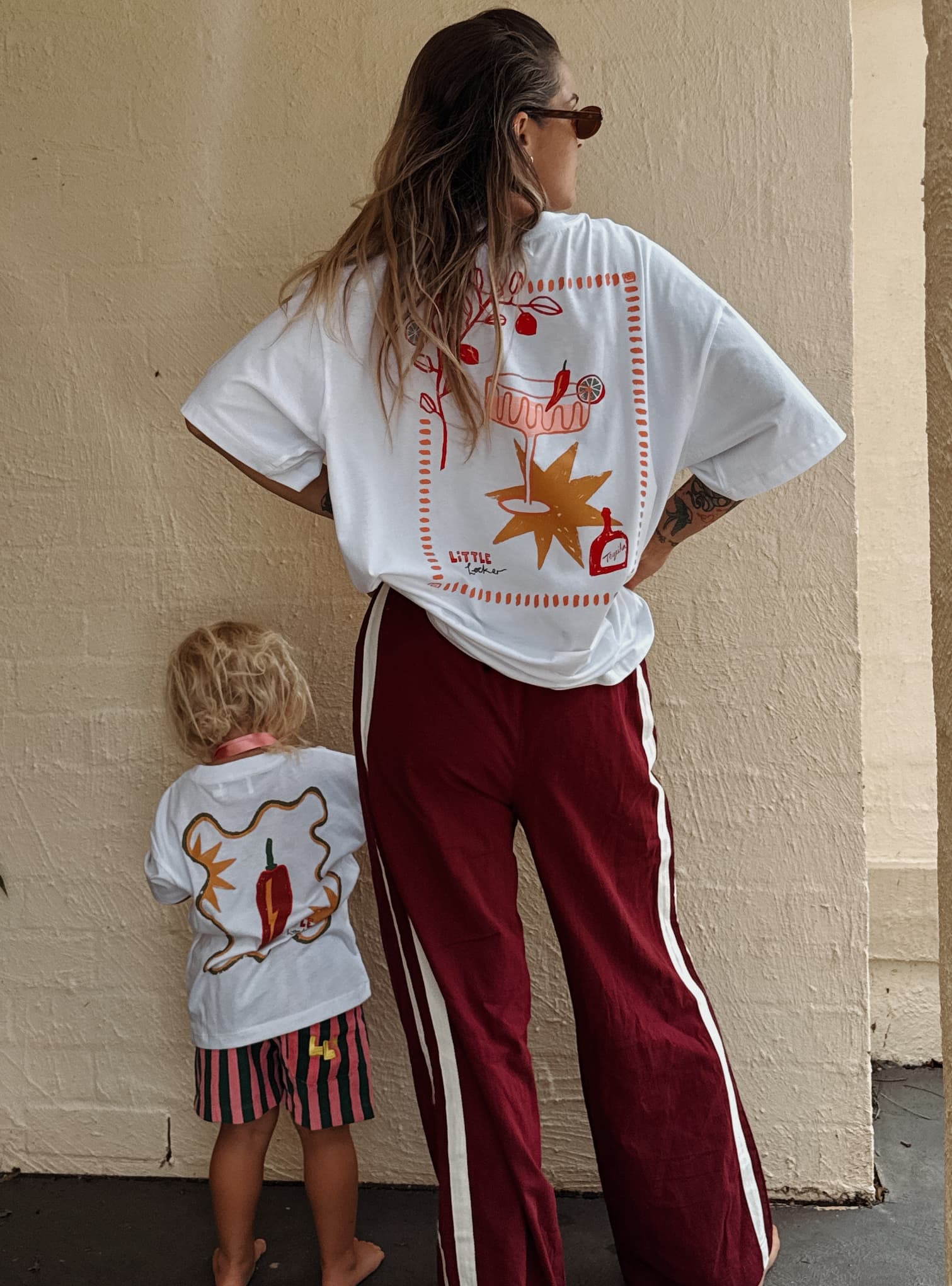 Mum and daughter wearing matching graphic tshirts by Little Locker. 100% cotton and oversized.
