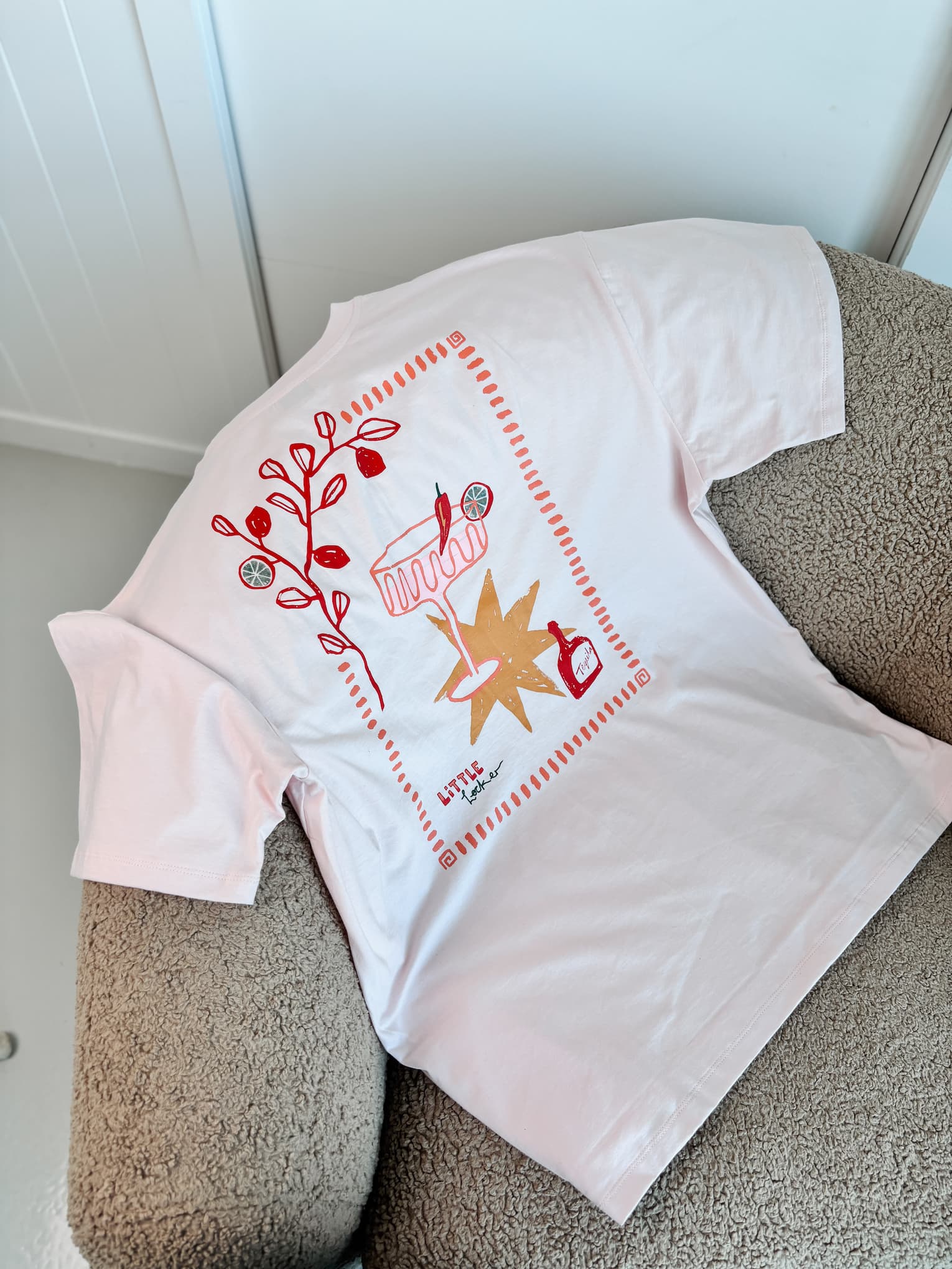 Close-up of the 'MOOD: SPICY MARGS' t-shirt graphic, showcasing the original artwork by Australian artist Camellia Pickle.