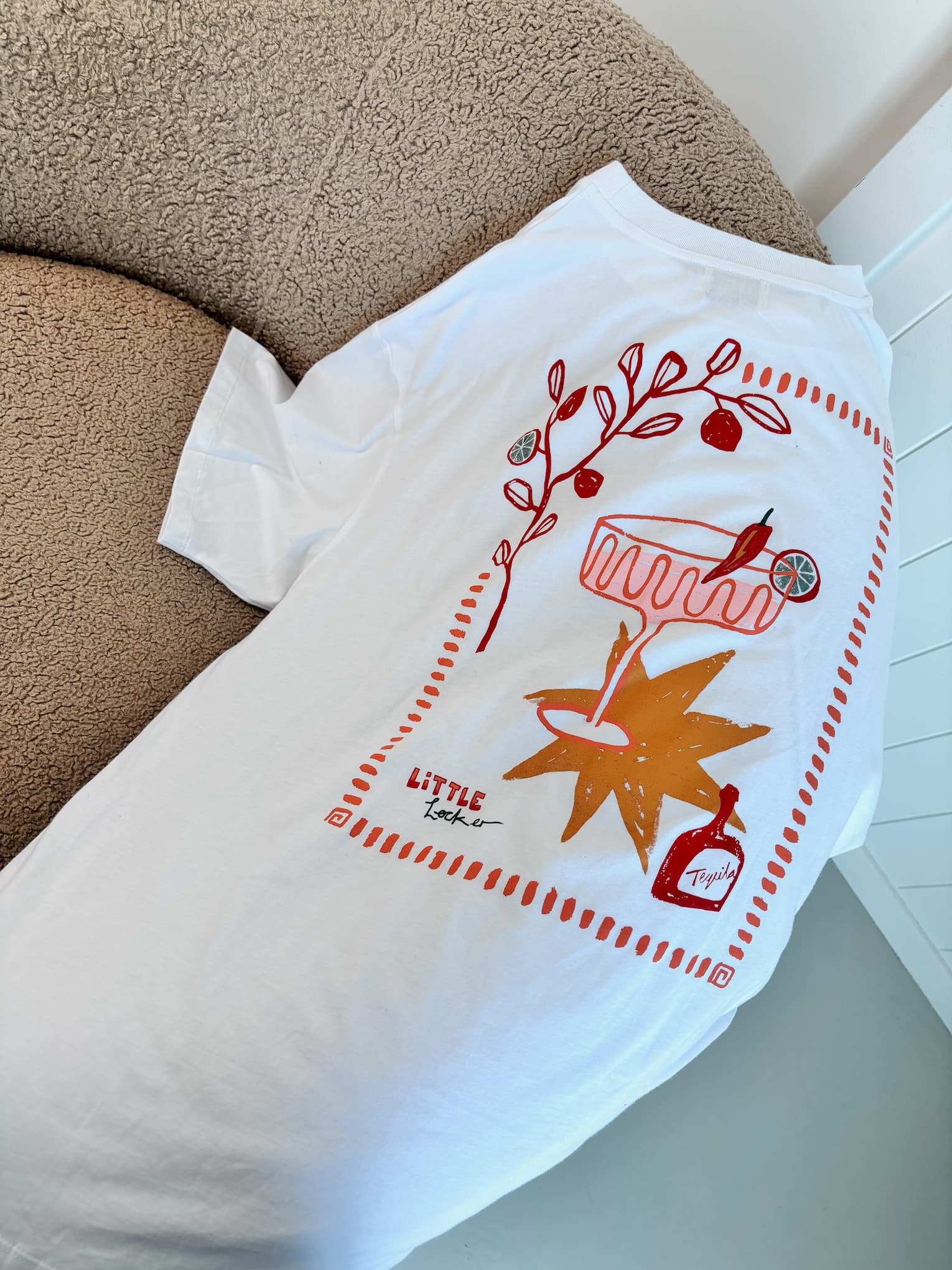 Close-up of the 'MOOD: SPICY MARGS' t-shirt graphic, showcasing the original artwork by Australian artist Camellia Pickle.