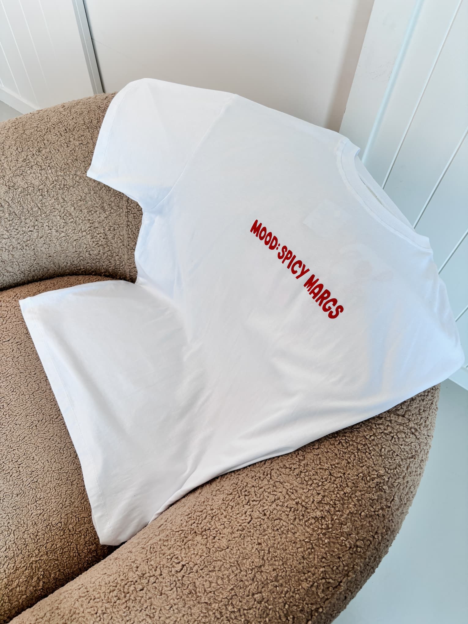 Front view of the women's oversized tee, highlighting the soft, buttery 100% combed cotton fabric and flattering drape.