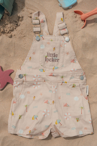 Ethically made gender-neutral summer overall with beach-inspired print