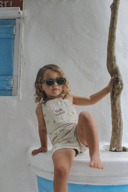 Ethically made gender-neutral summer overall with beach-inspired print