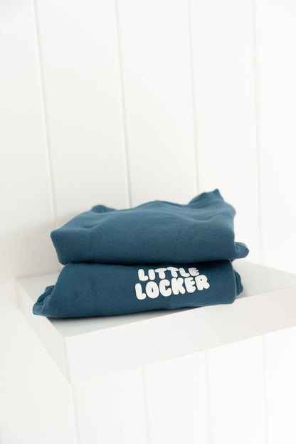 Midnight blue puff print track set for babies, toddler and kids. Made from soft cotton with relaxed fit and puff print logo