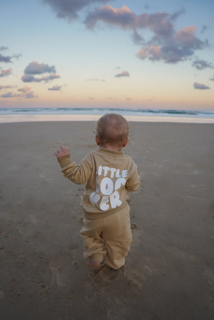 Neutral latte puff print track set for babies, toddler and kids. Made from soft cotton with relaxed fit and puff print logo