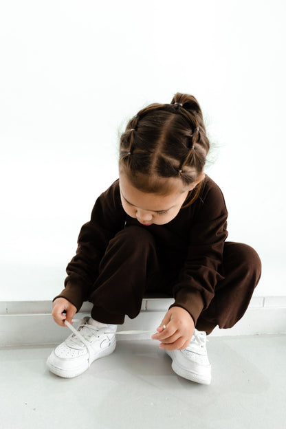 Neutral latte puff print track set for babies, toddler and kids. Made from soft cotton with relaxed fit and puff print logo