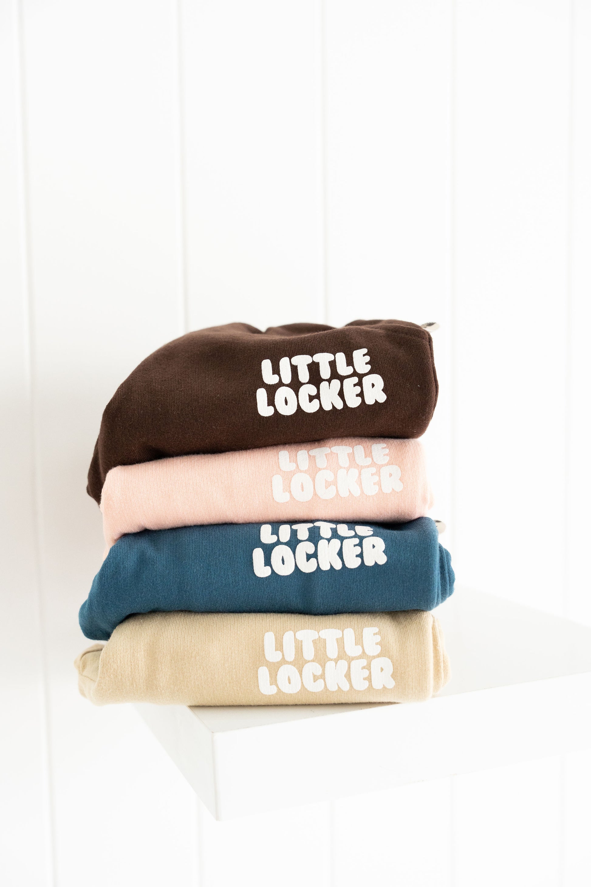 Neutral latte puff print track set for babies, toddler and kids. Made from soft cotton with relaxed fit and puff print logo